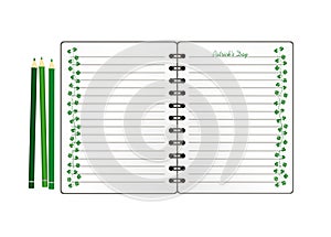 Notebook with template hand-drawn Green festive bunting with clover and pencil. Irish holiday - Happy St. Patrick`s Day with a