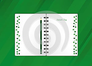 Notebook with template hand-drawn Green festive bunting with clover and pencil. Irish holiday - Happy St. Patrick`s Day with a