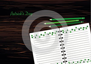 Notebook with template hand-drawn Green festive bunting with clover and pencil. Irish holiday - Happy St. Patrick`s Day with a