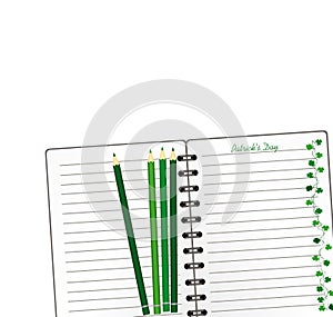 Notebook with template hand-drawn Green festive bunting with clover and pencil. Irish holiday - Happy St. Patrick`s Day with a