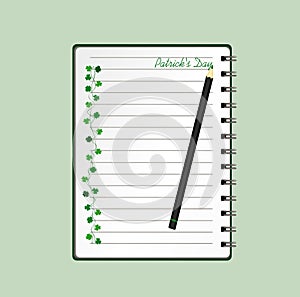 Notebook with template hand-drawn Green festive bunting with clover and pencil. Irish holiday - Happy St. Patrick`s Day