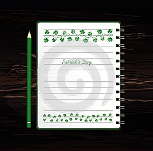 Notebook with template hand-drawn Green festive bunting with clover and pencil. Irish holiday - Happy St. Patrick`s Day with a gar