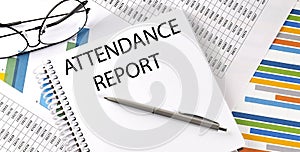 Notebook with text ATTENDANCE REPORT . Diagram and white background,Business