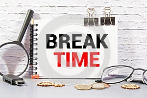 Notebook with text Break time on table with coffee, calculator and notebook