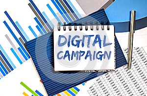 Notebook with Toolls and Notes about Digital Campaign