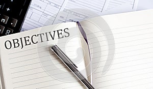 Notebook with Toolls and Notes about OBJECTIVES