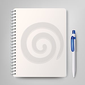 Notebook with a white plastic ballpoint pen