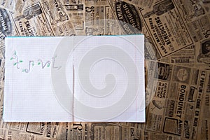 Notebook on a wooden background with seashells