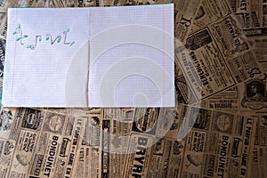 Notebook on a wooden background with seashells