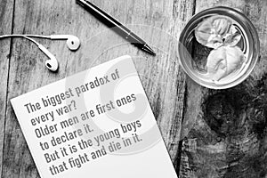 Notebook with words of wisdom about war - The biggest paradox of every war? Older men are first to declare it. But it is the young