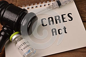 Notebook written with CARES ACT stands for The Coronavirus Aid, Relief and Economic Security Act photo