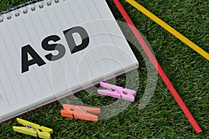 Notebook written with text ASD stands for Autism Spectrum Disorder