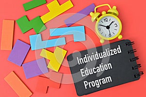 Notebook written with text INDIVIDUALIZED EDUCATION PROGRAM