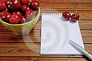 Notepad with cherries fruit