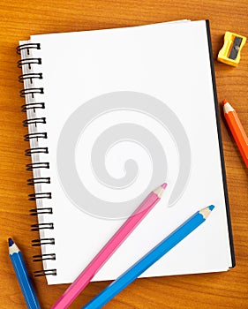 Notepad with color pencils