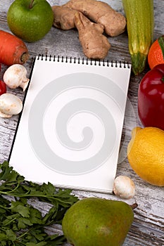 Notepad with fruit and vegetables.
