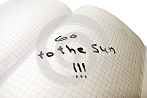 Notepad inscription Go to the sun, white background, isolated