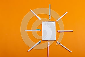 Notepad and many pens