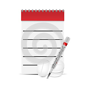 Notepad medical prescriptions and pills and thermo