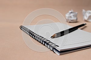 Notepad or notebook with pencil