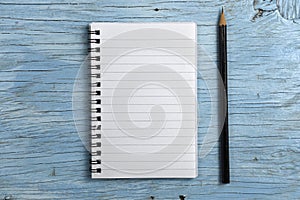 Notepad with pencil