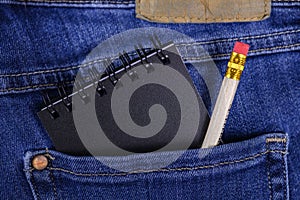 Notepad and pencil in pocket