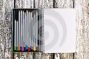 Notepad with pencils mocap. Place for text