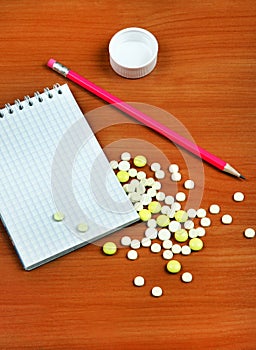 Notepad and a Pills