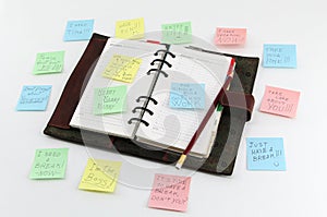 Notepad with postit about stress