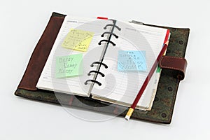 Notepad with postit about success