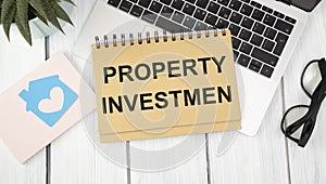 Notepad with PROPERTY INVESTMEN text