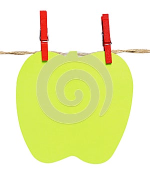 Notepad shaped apple hanging from a rope