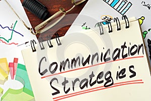 Notepad with sign Communication Strategies.