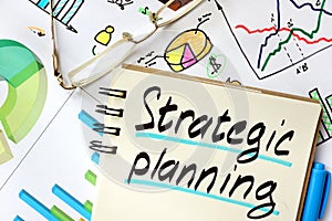 Notepad with sign strategic planning. photo