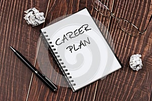 Notepad with text career plan writing