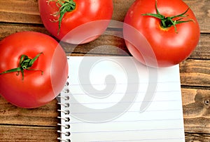 Notepad with tomatoes