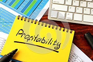 Notepad with word profitability. photo