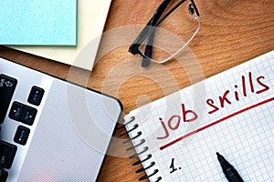 Notepad with words job skills.