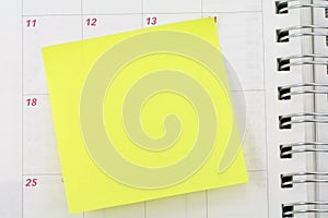 Notepaper sticking on calendar