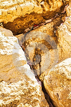 Notes between stones at wailing or western wall