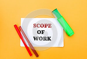 Notes with the word Scope of work and markers. Business operations, tasks and settings. Bill of quantities concept