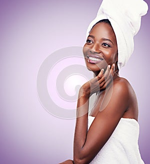 Nothing like the tingly sensation of clean, fresh skin. Studio shot of a beautiful young woman wearing a towel on her photo