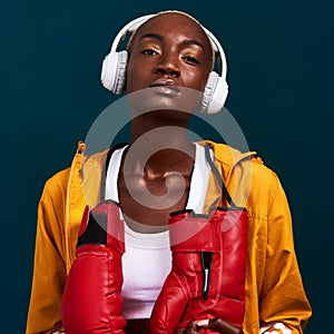 Nothing stands between me and my goals. Cropped portrait of an attractive young female boxer standing alone and posing