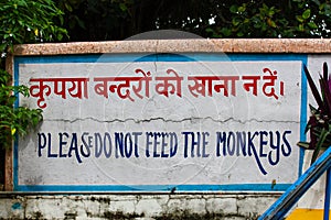 Notice board written `please do not feed the monkeys` in Rishikesh, Uttarakhand