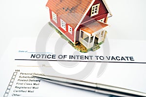 Notice of intent to vacate letter and pen