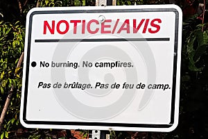 A notice no burning no campfires sign