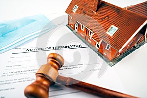 Notice of termination form with apartement model house photo