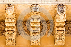 NOTO, ITALY - Detail of Baroque Balcony, 1750 photo