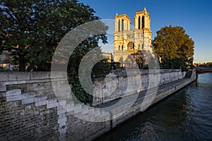 Notre Dame Cathedral and Seine River at sunset. Paris, France photo