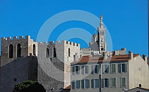 Notre-Dame de la Garde cathedral and Abbey of Saint Victor towers in Marseille - France